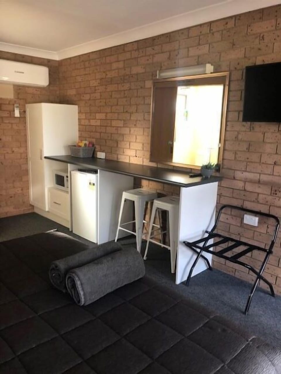 Laptop workspace, blackout drapes, iron/ironing board, WiFi (free)
