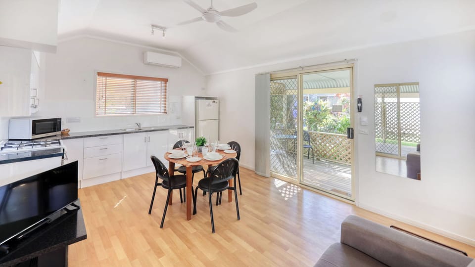 Queen Cabin | Living area | Flat-screen TV, DVD player