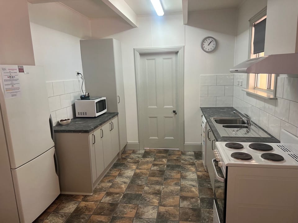 Standard Suite, Multiple Bedrooms, Kitchen (House 2) | Private kitchen | Coffee/tea maker, fridge, microwave (on request), stovetop