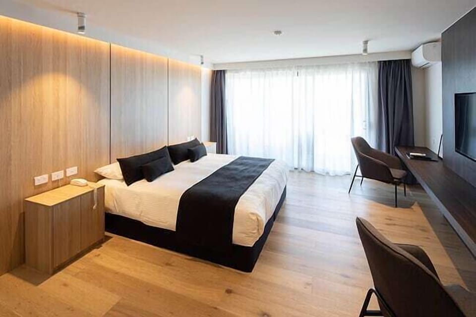 Premium bedding, blackout drapes, iron/ironing board, WiFi (free)
