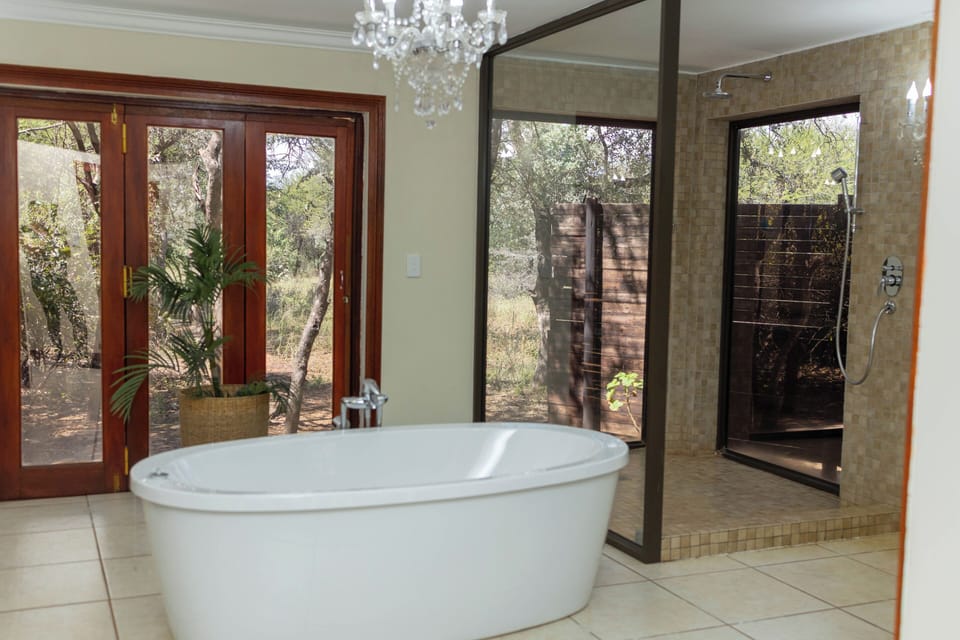 Family Chalet | Bathroom | Separate tub and shower, deep soaking tub, rainfall showerhead