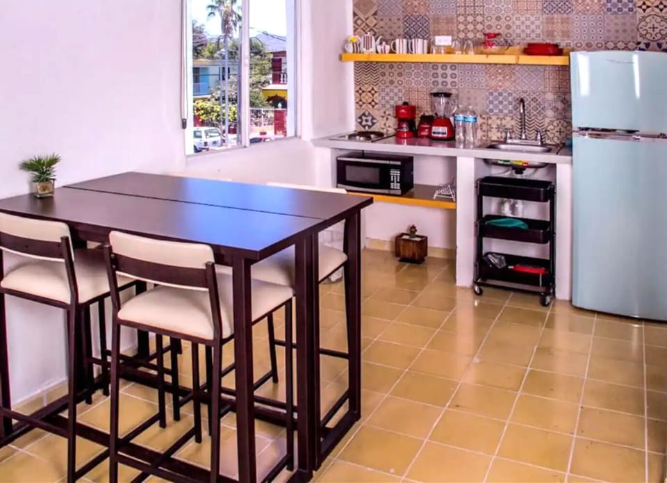 Deluxe Suite | Private kitchen | Microwave, stovetop, coffee/tea maker, blender