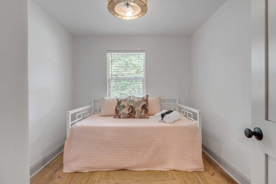 Bedroom 3's twin + twin trundle that pulls out for sleeping guests 5 + 6.
