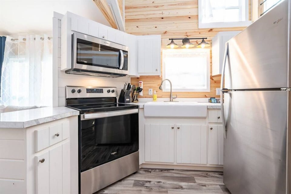 For a tiny kitchen, this one features full size appliances and is well appointed.