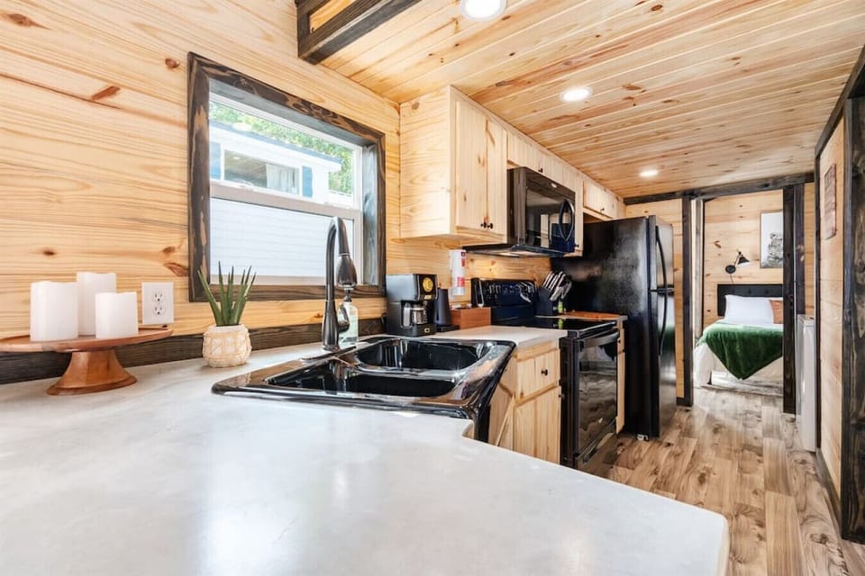The rustic, well appointed kitchen is ready for the budding chef or cook! With full size appliances, dinnerware, cookware, bakeware plus a toaster, blender and spices to get you started, you`ve got what you need to make breakfast, lunch and dinner.