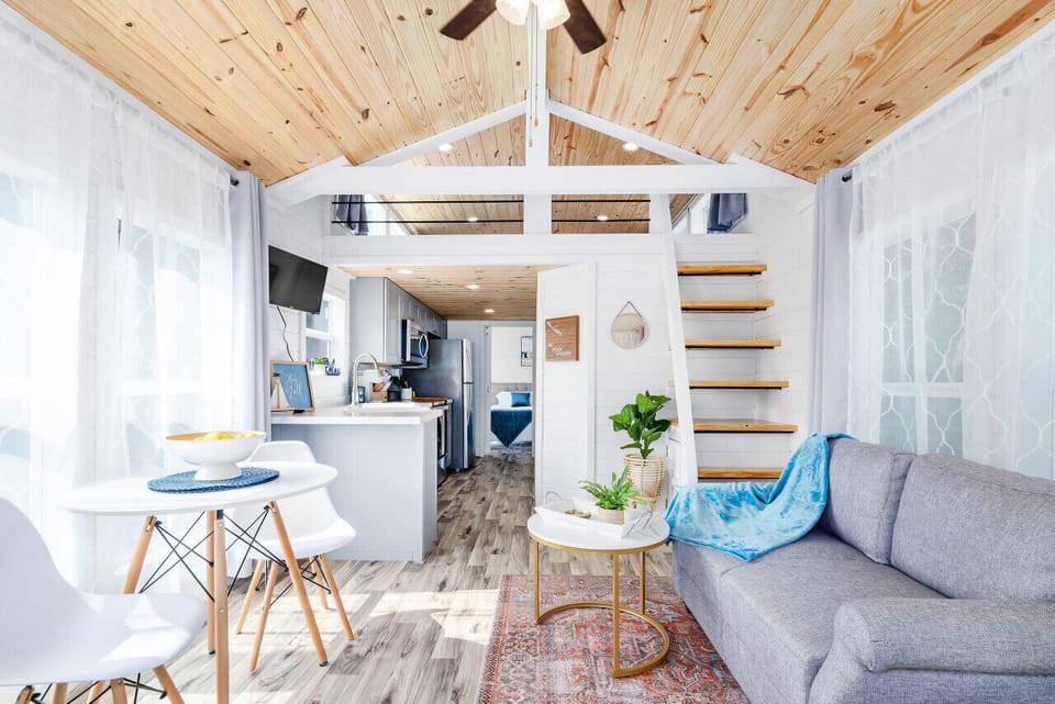 Bright, open living space designed for slow mornings, easy meals, and cozy weekends away.