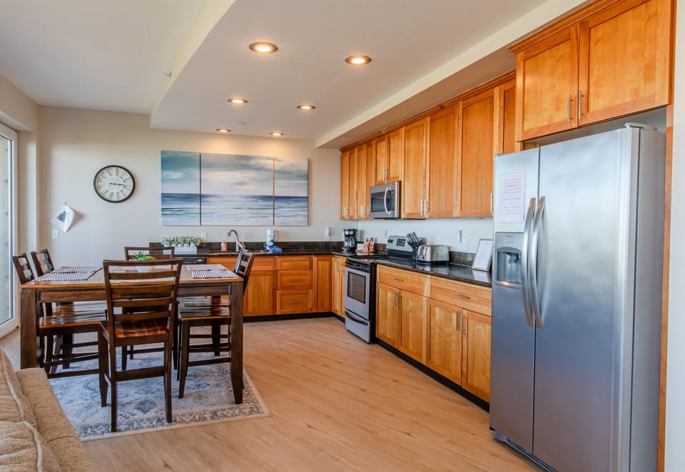 [Kitchen] is Fully Stocked with Updated Stainless Steel Appliances.