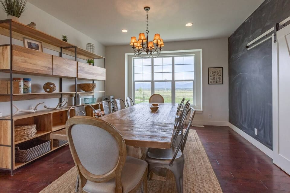 Dine with a view—chalkboard wall and curated decor add extra charm