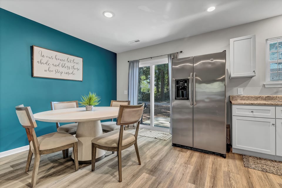The dining room effortlessly connects to the kitchen in this open floor plan. 