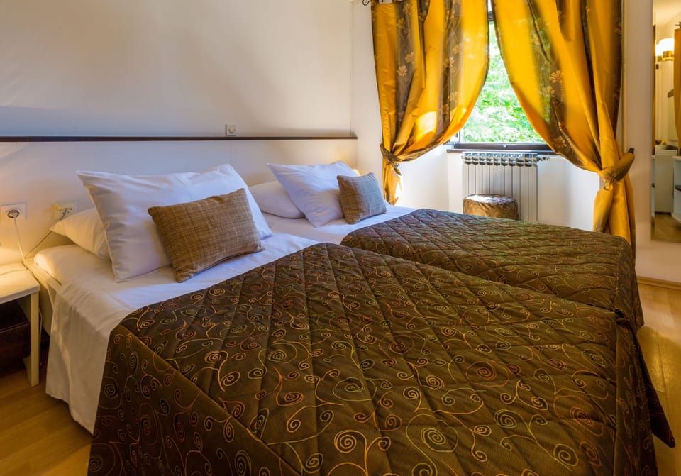 Desk, blackout drapes, WiFi (free), bed sheets