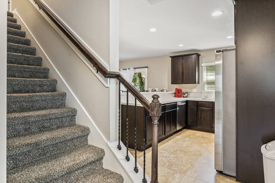 Stairs to the 2nd level for the bedrooms and laundry