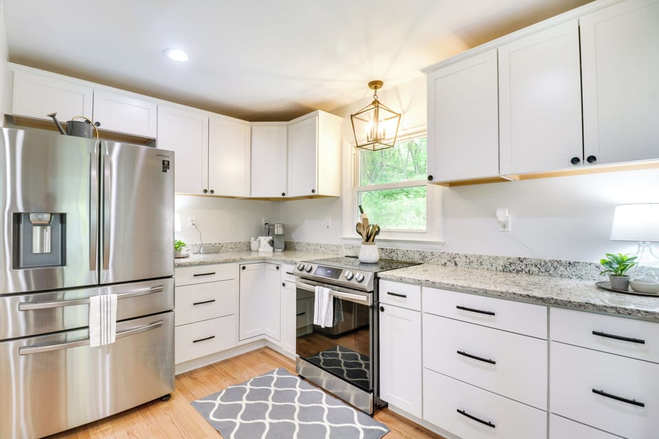 Meme's Kitchen is fully stocked with pots and pans, baking dishes, drip Coffee maker with filters and a Keurig.