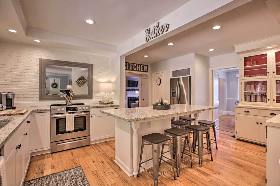Spacious kitchen with island seating — perfect for cooking and gathering together