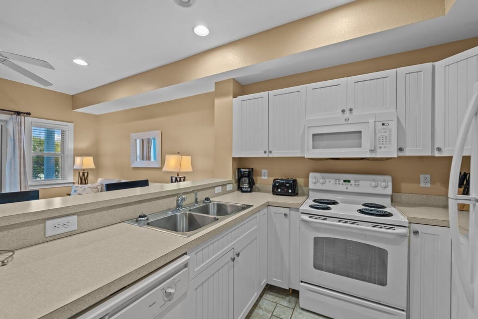 Kitchen with Bar Seating on Second Level