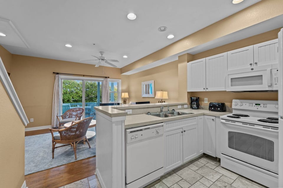 Kitchen with Bar Seating on Second Level