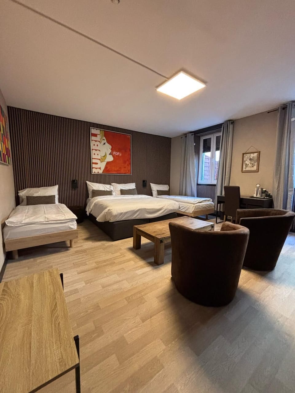 Standard Quadruple Room, 1 Bedroom, Courtyard View | In-room safe, desk, iron/ironing board, free WiFi