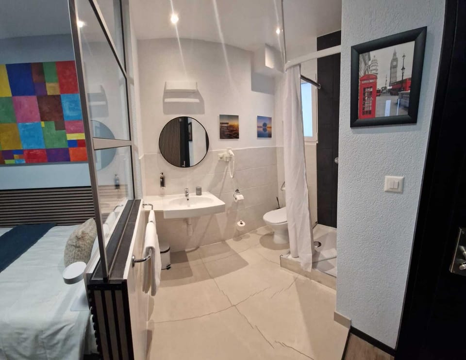 Standard Single Room, 1 Twin Bed | Bathroom | Hair dryer, towels, soap, shampoo