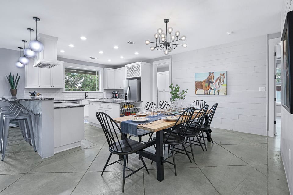 As you walk in from the entry door you will see the dining area to your right.  Straight ahead you can see the door to the laundry room.