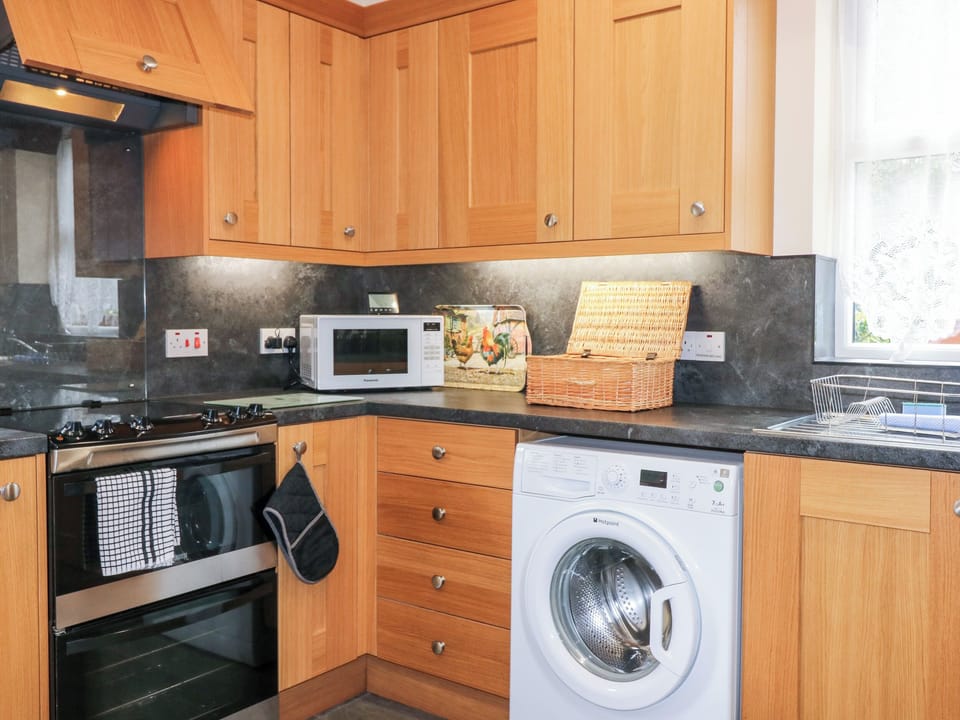 Fridge, electric kettle, toaster, cookware/dishes/utensils