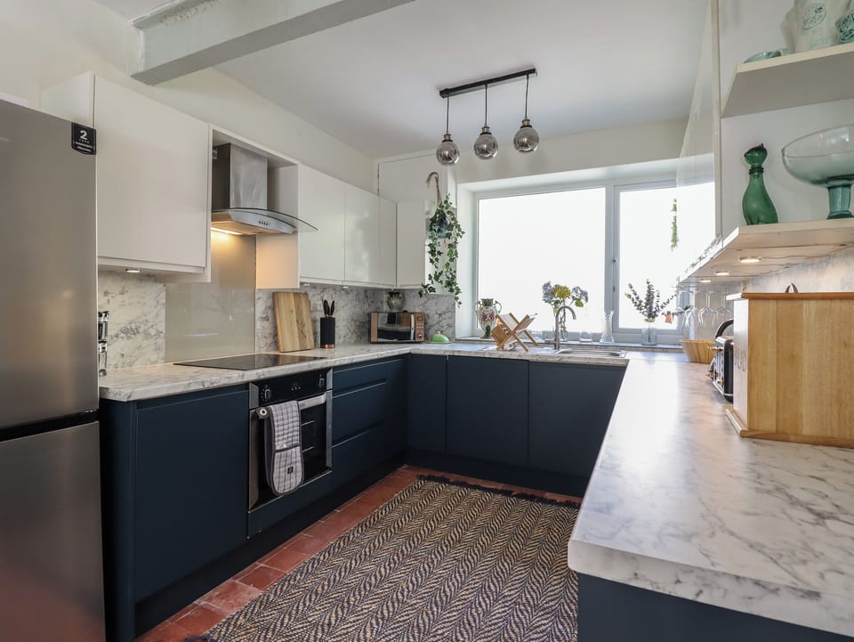 Fridge, electric kettle, toaster, cookware/dishes/utensils