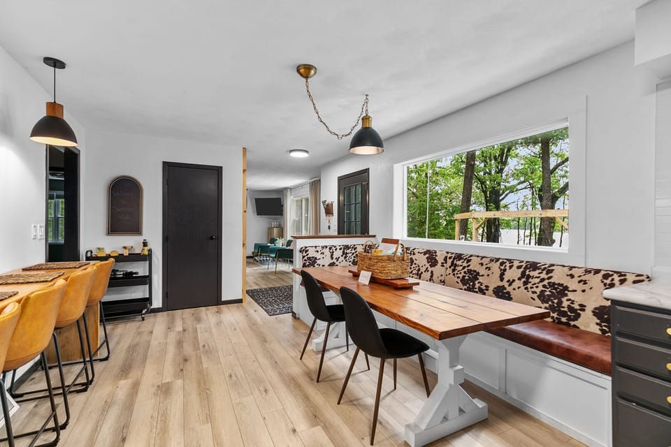 Gather around the kitchen table and enjoy meals with a beautiful view of the lake.