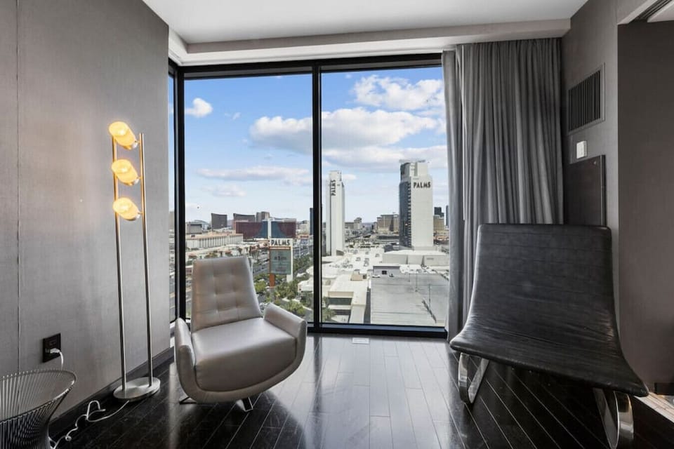 As you step towards the windows, you`ll be captivated by the breathtaking view of Las Vegas that stretches out before you.