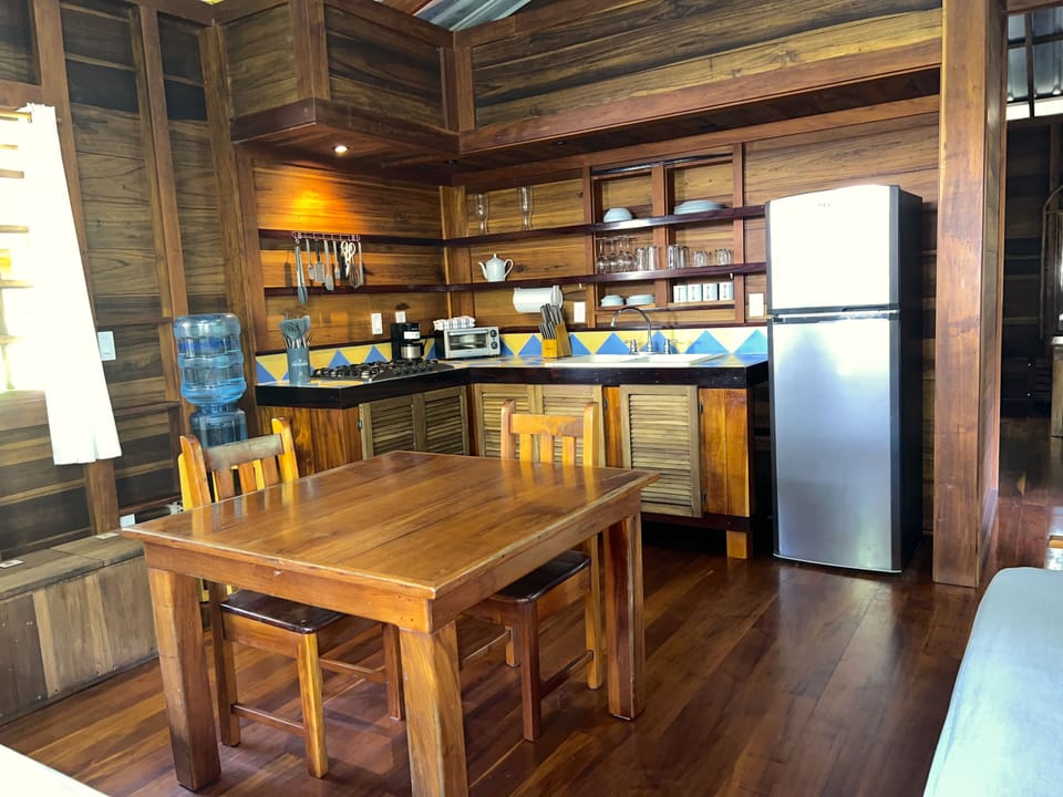 Suite | Private kitchen | Highchair, cleaning supplies, paper towels