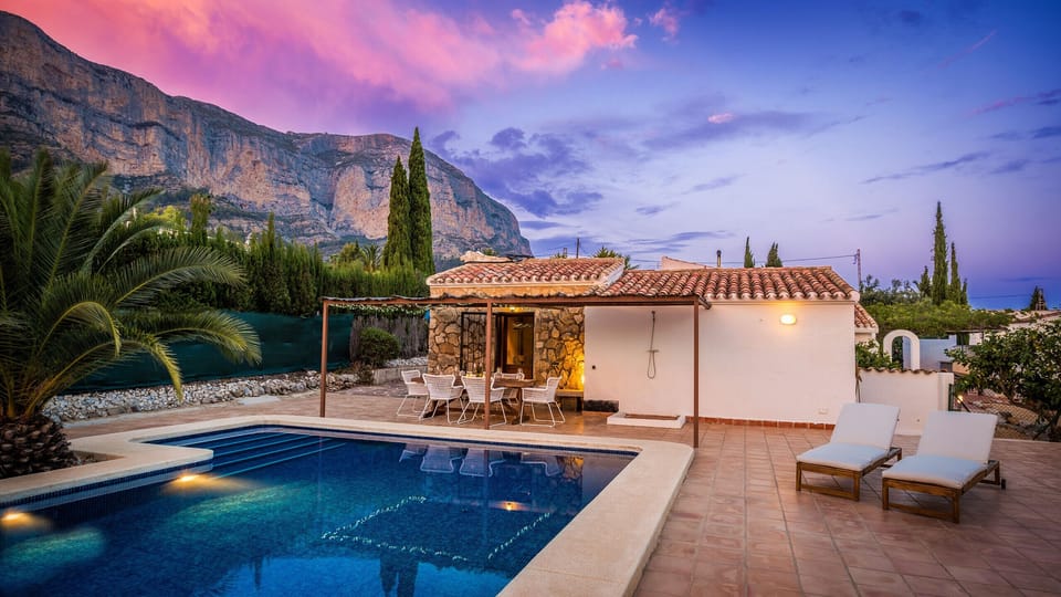 Pool and House at Night