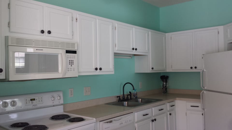 Full size kitchen with all amenities and a pantry.