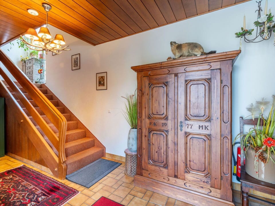 Plant, Property, Cabinetry, Wood, Interior Design, Wood Stain, Floor, Stairs, Paint, Flowerpot