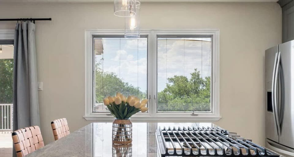 Granite countertop and a gas cooktop