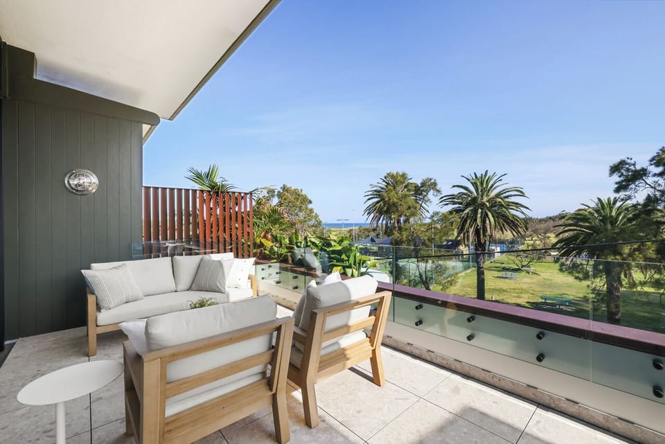 Sunny balcony overlooking park