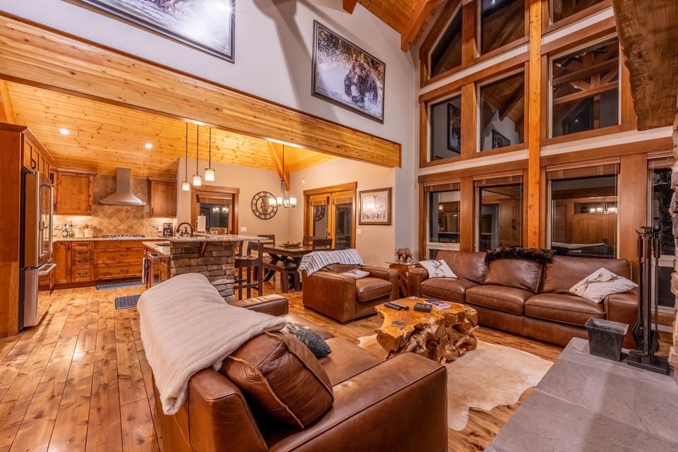 You'll love the attention to detail throughout this beautiful home.  Vaulted ceilings, comfortable couches, large smart TVs, Sonos sound bars, a real fireplace, large kitchen with everything you'll need to feed everyone.