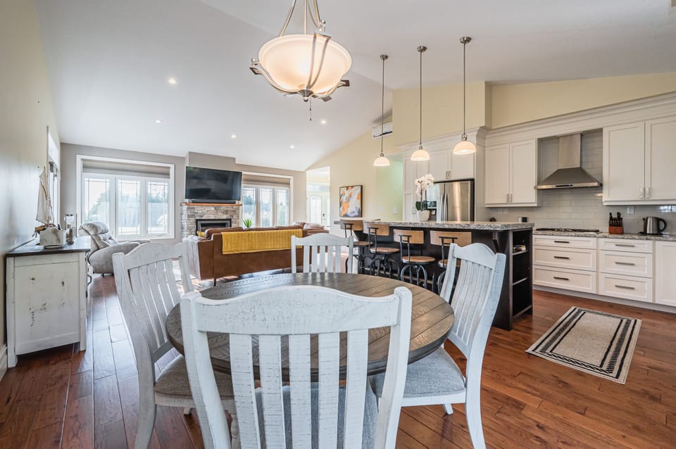 Enjoy a view of the great room from the kitchen table. It is perfect for doing puzzles, playing cards or enjoying company. 