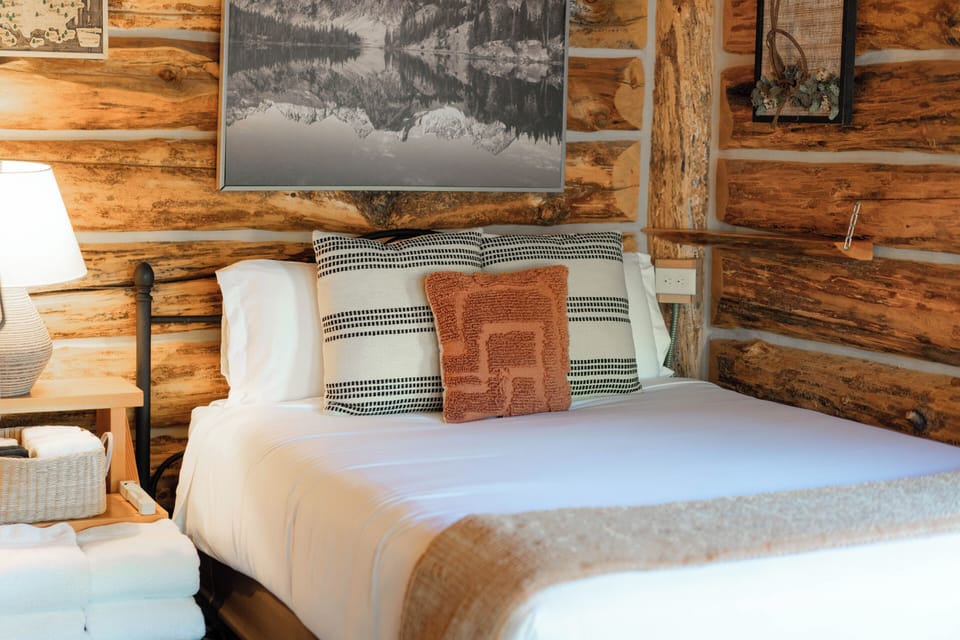 It may be a log cabin but the bed is luxurious!