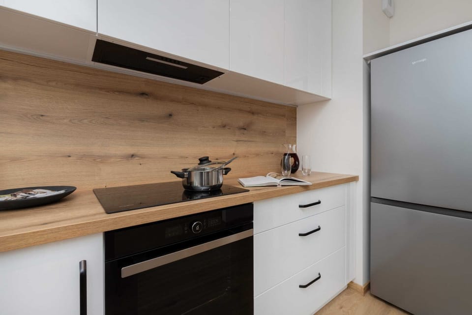 Another angle of the kitchen showcasing its functionality and contemporary design.

