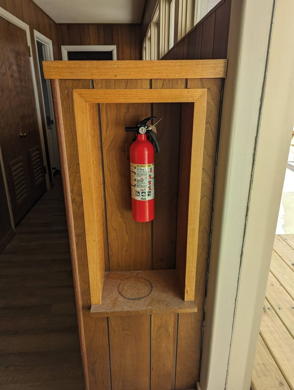 Fire Extinguisher Located in Hallway for Safety