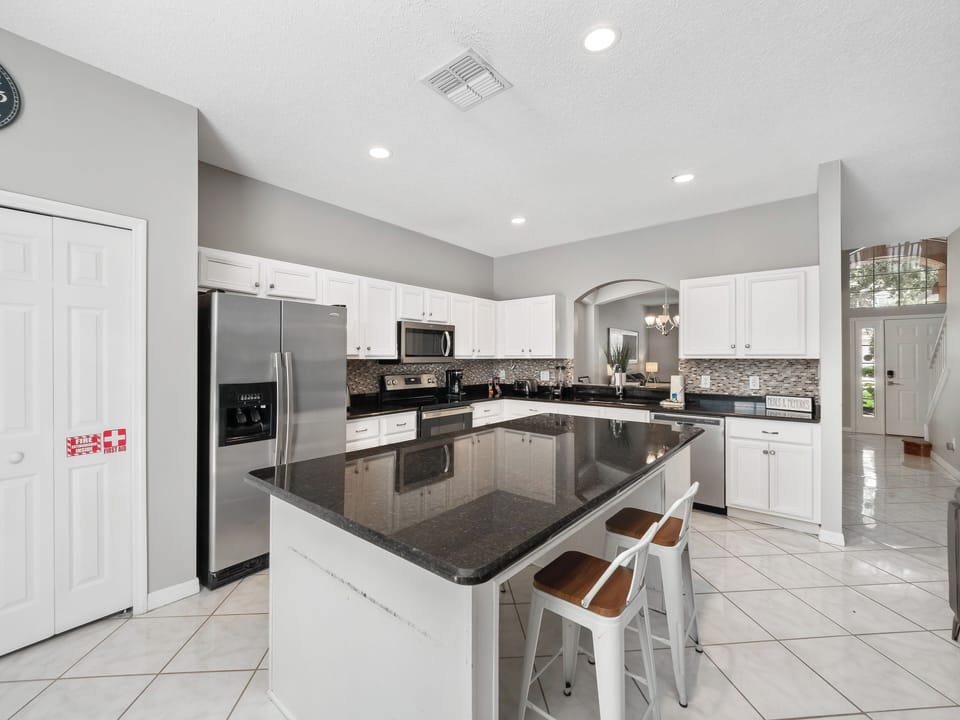 Spacious Full Size Modern Kitchen with Bar Stool Seating
