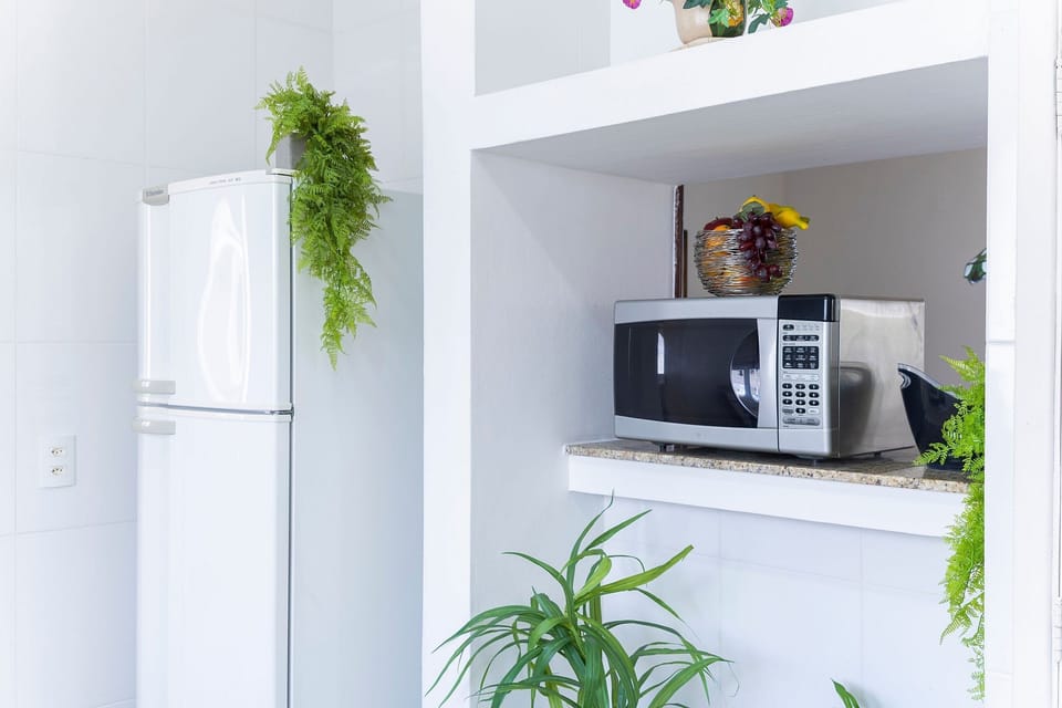Villa | Private kitchen | Fridge, microwave, oven, blender