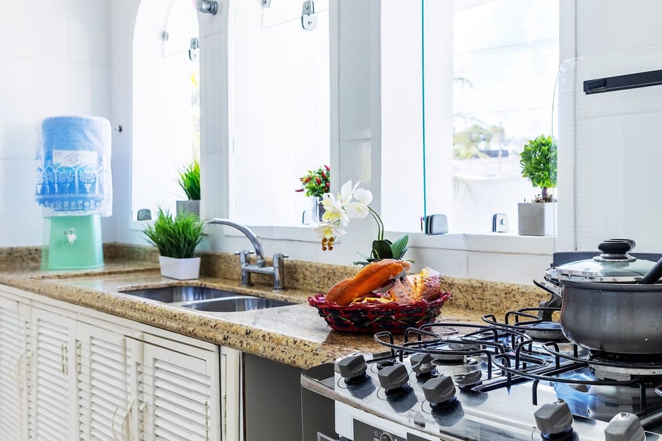 Villa | Private kitchen | Fridge, microwave, oven, blender