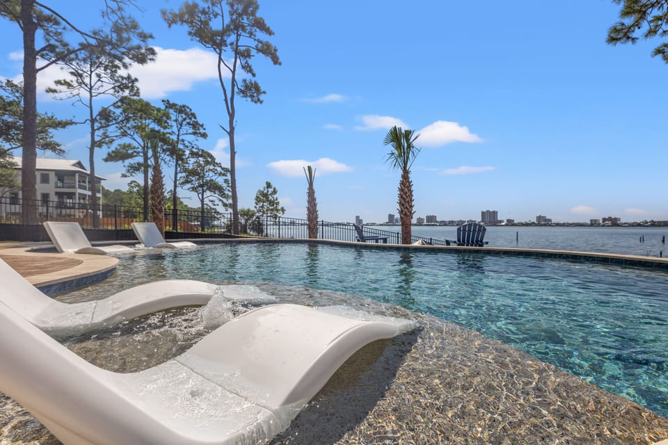 HEATED POOL, 2 TANNING LEDGES WITH BUBBLERS