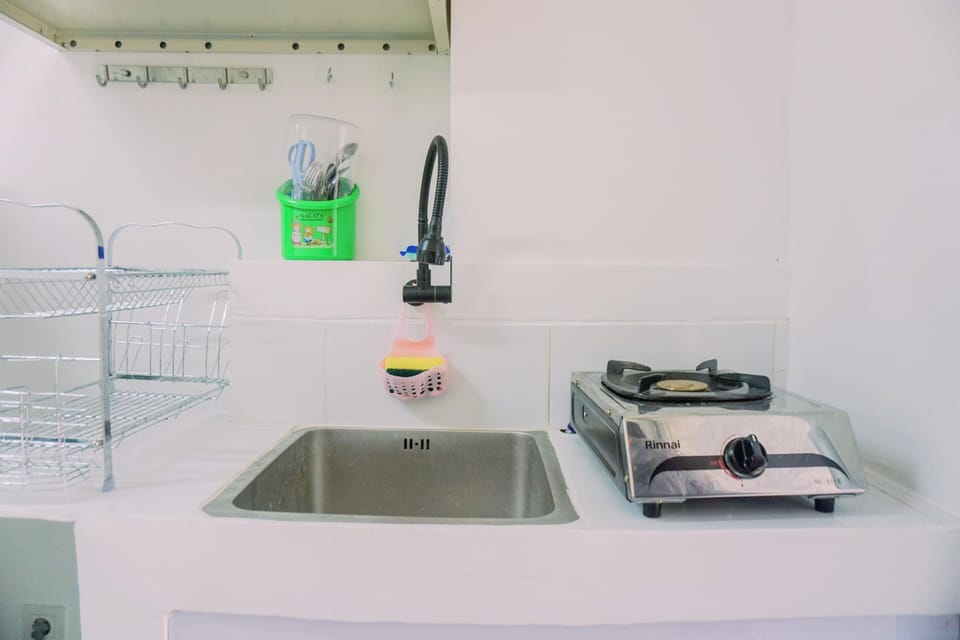 Apartment | Private kitchen | Full-size fridge, stovetop