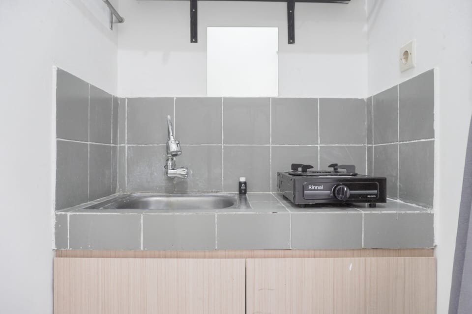 Apartment | Private kitchen | Full-size fridge, stovetop