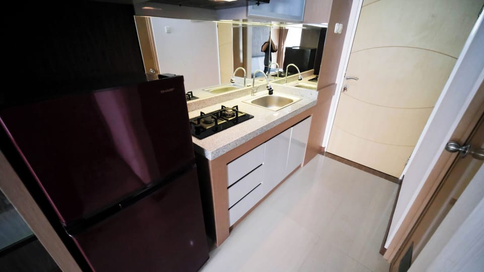Apartment | Private kitchen | Full-size fridge, stovetop
