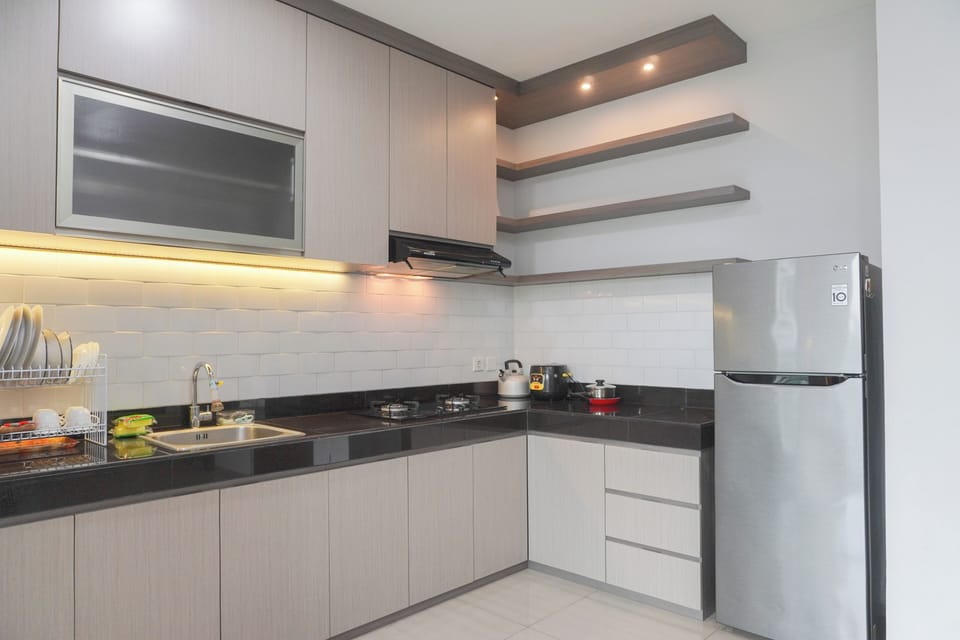 Apartment | Private kitchen | Full-size fridge, stovetop