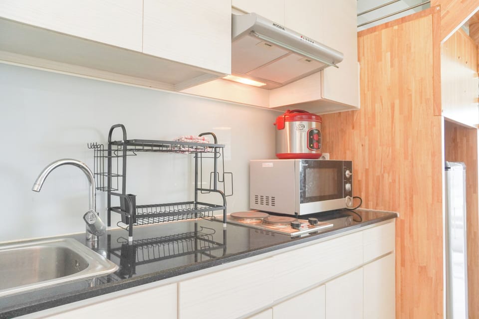Apartment | Private kitchen | Full-size fridge, stovetop