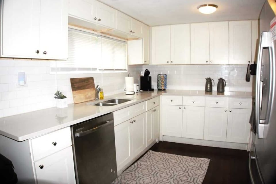 Kitchen with:
Keurig coffee Maker
K-Pods with Breakfast Blend & Decaf
Oven/Stove
Full French Door Refrigerator
Dishes, Pots, Plates, Cups, & Silverware
Knife set and cutting board