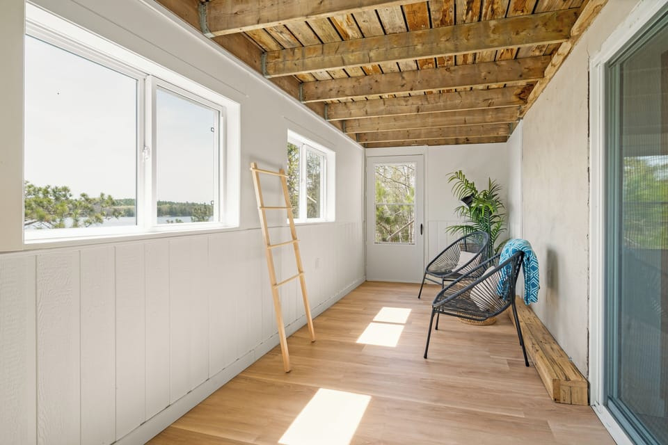 Denvic House sunroom, perfect for reading, relaxing and getting ready to jump in the lake