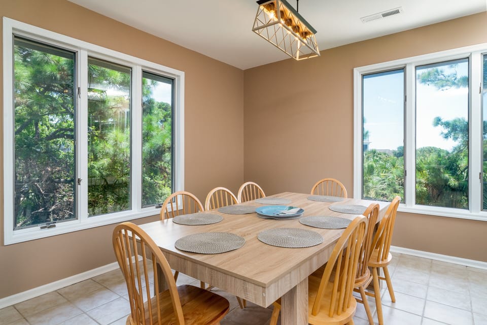 The dining table seats 8 and has lovely views out to the ocean