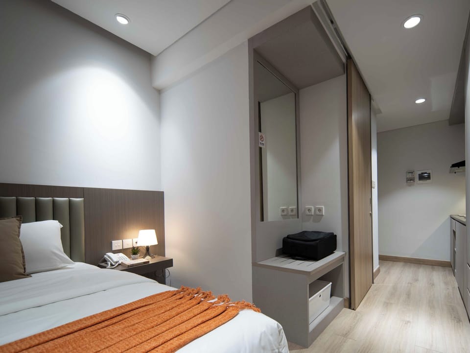 Deluxe Room | 1 bedroom, desk, laptop workspace, free WiFi